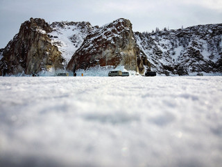 Tough rocks of Olkhon Island near Cape Khoboy by winter, Baikal Lake, Russia
