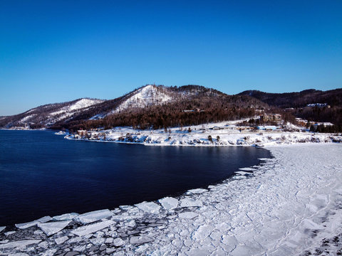 Angara River source and frozen Baikal Lake view, Russia