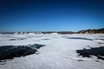 View of frozen Baikal Lake covered by snow, Russia