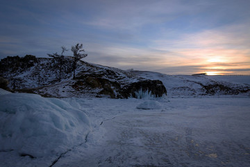 Frozen rocks of Olkhon Island view by winter, Baikal Lake, Russia