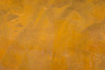 Yellow concrete wall background