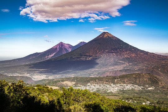 View of Volcan de Agua and Acatenango from the slopes of Pacaya volcano near Antigua in Guatemala, Central America. Volcanic daytime landscape of Central Guatemala.