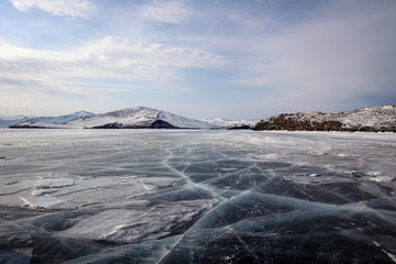 Pure ice of frozen Baikal Lake view near Olkhon Island, Russia