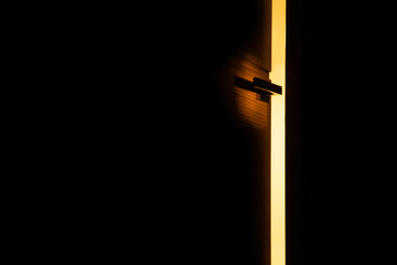 a golden door, an exit into the light, into another world, into a parallel world, into the kingdom of saints, open door light yellow, warm, imagination, enter, gap, sunbeam, wooden, hope, exit, indoor
