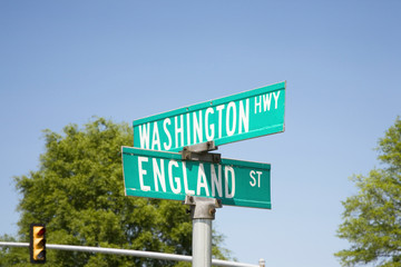 Street signs at an intersection that read England St. and Washington Hwy off Route 1 in Virginia south of Washington, DC, symbolizing the Special Relationship that exists between England and America