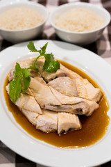 Steam chicken with sauce close up