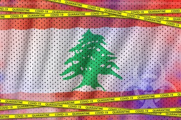 Lebanon flag and Covid-19 quarantine yellow tape. Coronavirus or 2019-nCov virus concept