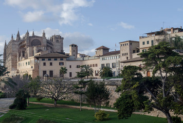 Fototapeta na wymiar Mallorca, Spain, January 25th 2020: The Cathedral and sa murada of Palma de Mallorca