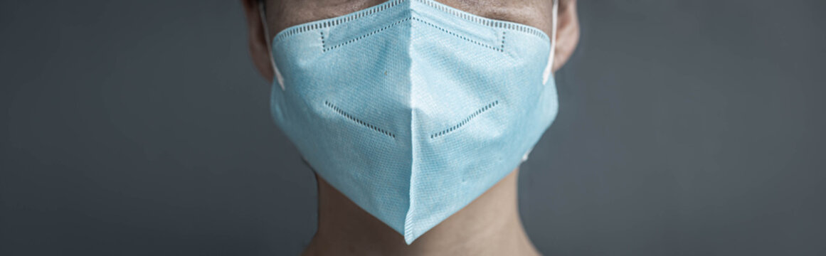 Man Wearing N 95 Surgical Mask. Corona Virus Protection.