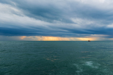 Vivid sunset over the Black Sea with stormy clouds