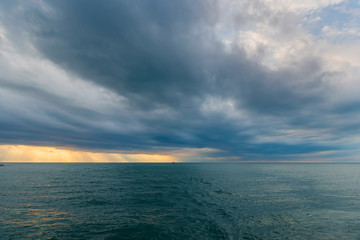 Vivid sunset over the Black Sea with stormy clouds