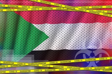 Sudan flag and Covid-19 quarantine yellow tape. Coronavirus or 2019-nCov virus concept