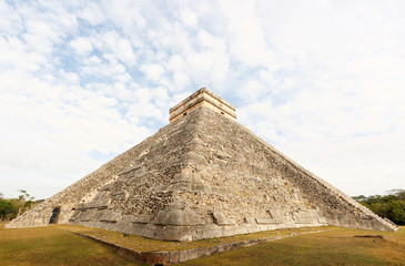 Chichen Itza is a world-famous complex of Mayan ruins on Mexico's Yucatan Peninsula. Photo Shows A massive step pyramid known as El Castillo.