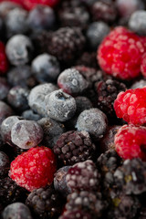 frozen raspberries, blackberries and blueberries close up
