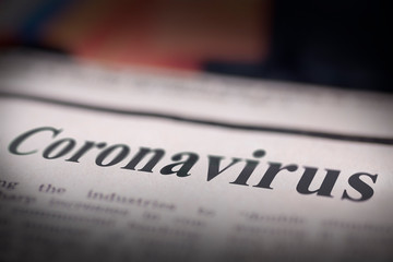Fototapeta premium Coronavirus written newspaper