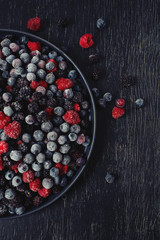 frozen raspberries, blackberries and blueberries close up