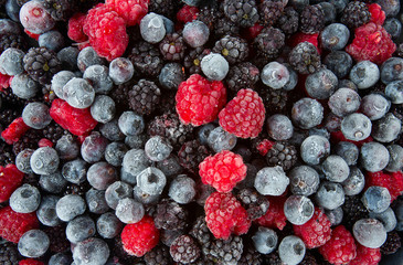 frozen raspberries, blackberries and blueberries close up