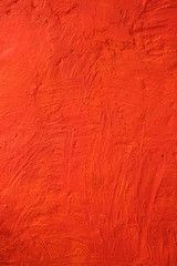 Textural stone wall in lush lava hue.