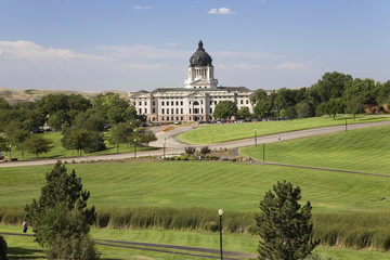 Fototapeta na wymiar Green grass of park leading to South Dakota State Capitol and complex, Pierre, South Dakota