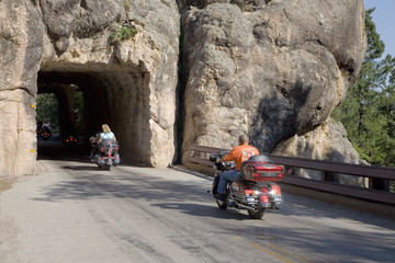 Motorcyclists driving through tunnels of Black Hills during the 67th Annual Sturgis Motorcycle...