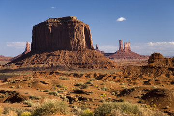 Red buttes and colorful spires of Monument Valley Navajo Tribal Park, Southern Utah near Arizona border