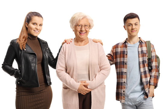 Young Woman And A Male Student Standing Next To An Older Lady