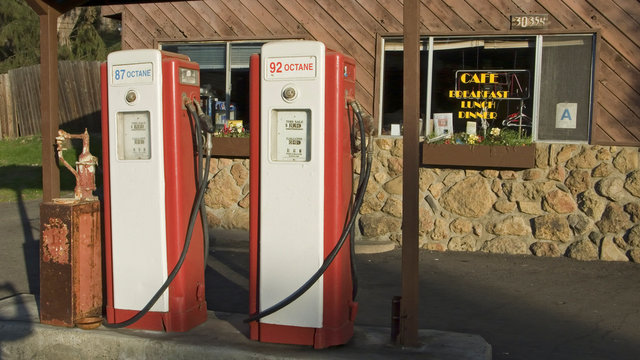 Antique red gas pumps in front of old gas station in Malibu, Southern California north of Los Angeles