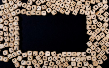 Cubes on a black background are scattered as a horizontal frame