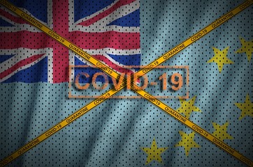 Tuvalu flag and Covid-19 stamp with orange quarantine border tape cross. Coronavirus or 2019-nCov...