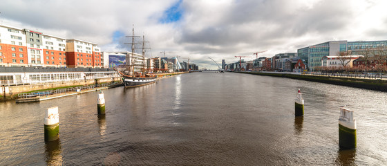 Fototapeta premium Beautiful scene daylight Dublin Ireland capital landscape city urban area old town modern office building Samuel Beckett Bridge