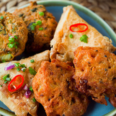 Spicy vegetable Indian snacks -  pakora, samosa, onion bhaji