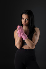 Woman boxer training hard.