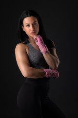 Woman boxer training hard.