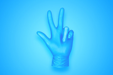 Fototapeta na wymiar rubber glove isolated on background / abstract background photo