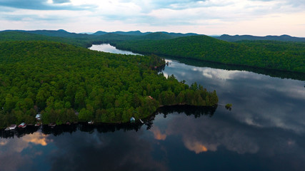 Adirondack lake in summer at sunset