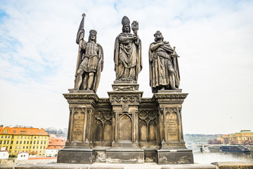 Prague, Czech republic - March 19, 2020. Statues of Charles Bridge without tourist during Covid-19 travel ban