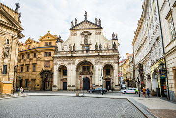 Fototapeta na wymiar Prague, Czech republic - March 19, 2020. Square Krizovnicke namesti in front of entrance to Charles Bridge without tourists during Covid-19 travel ban