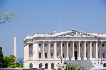U.S. Senate side of U.S. Capitol with Washington Monument in background, Washington D.C..