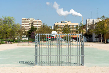 street soccer and basketball courts for youth competitions with city background