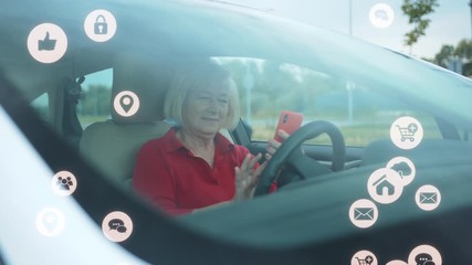 Senior woman sits car uses cell phone businesswoman white animation сloud technology internet networking device online storage computing icon network connection virtual interface digital slow motion - Powered by Adobe