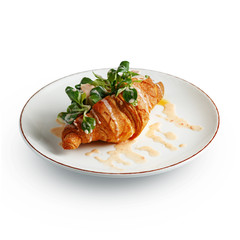 mouthwatering croissant with chicken filling, exquisite restaurant breakfast dish is a classic serving.