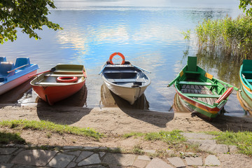 Rowing boats by the river