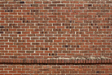 Shabby chic old brown and red brick wall texture with light colored mortar