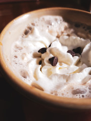 Hot Latte Drink With Whipped Cream And Chocolate Chips