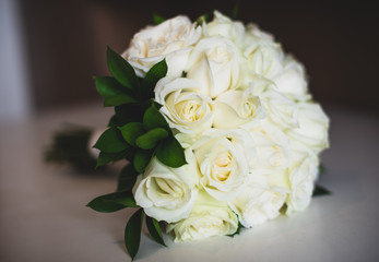 Beautiful white roses wedding bouquet