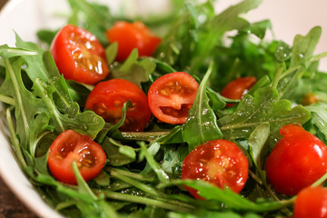 Close up of Fresh Salad with Baby Spinach and Cherry Tomatoes.
