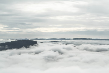 Fototapeta na wymiar sea of fog on top of the moantain ,nice view background
