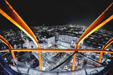 Kyoto night panorama view and orange railing from the Kyoto Tower, Japan