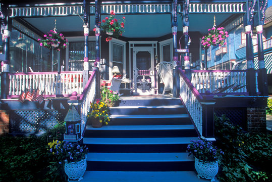 Front Porch And Chairs Of Victorian Home In Cape May, NJ