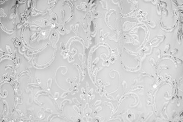 Close up of a wedding dress or bridal gown which is the dress worn by the bride during a wedding ceremony.